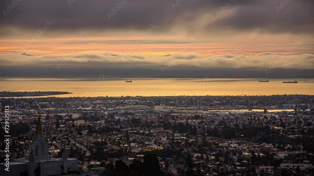 San Francisco Bay as seen from Oakland California - time lapse of low-lying clouds and the sunshine reflecting off the ocean San Francisco Bay as seen from Oakland California - time lapse of low-lying clouds and the sunshine reflecting off the ocean