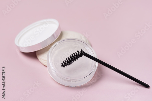 White gel for eyebrows on pink background Cosmetic Product Close Up