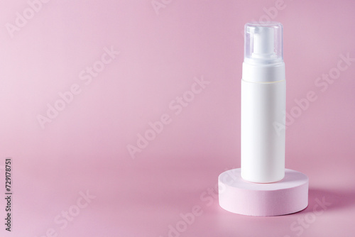 White bottle cosmetic product on pink round platforms Exhibition pink podiums with cosmetics product Blank package mockup commercial showcase pink background horizontal