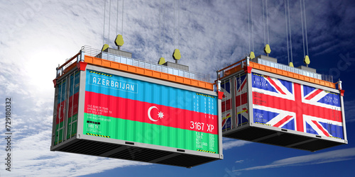 Shipping containers with flags of Azerbaijan and United Kingdom - 3D illustration