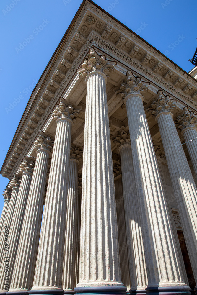 Portico of the famous St. Isaac Cathedral on a summer day. View from below. Saint Petersburg. Russia Portico of the famous St. Isaac Cathedral on a summer day. View from below. Saint Petersburg. Russia