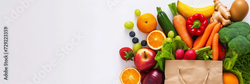 Background of nutritious food delivery  Vegetarian food in paper on white backdrop  with space for text  banner background