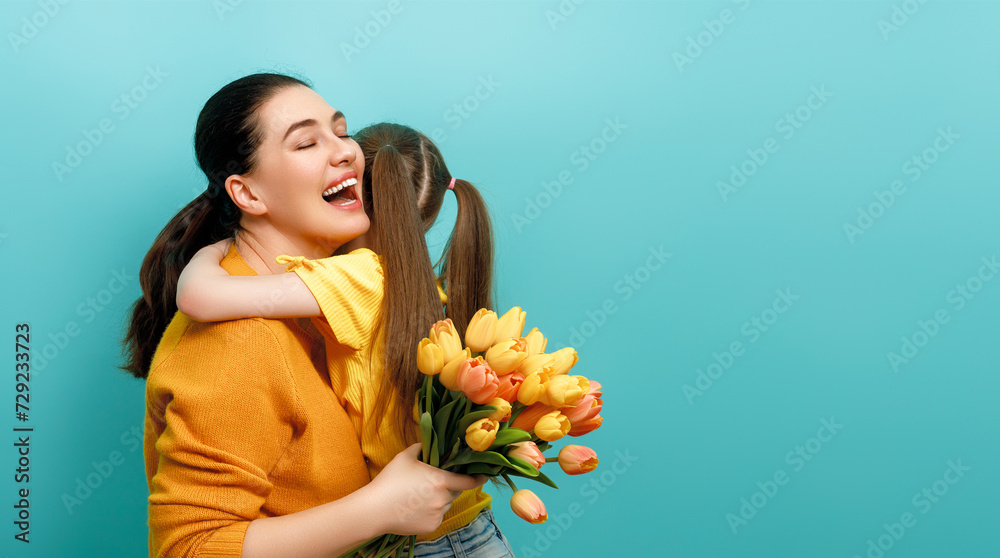 Daughter and mother with bouquet of flowers Daughter and mother with bouquet of flowers