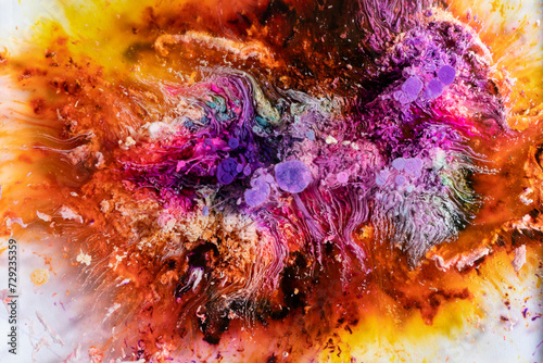 Cosmic color burst in abstract fluid art photo