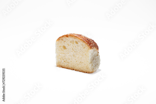 Sweet bun in a section on a white background. School bun from Berdyansk bakery