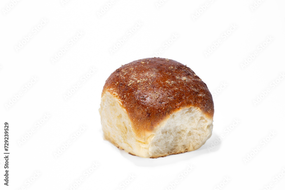 Sweet bun on a white background. School bun from Berdyansk bakery Sweet bun on a white background. School bun from Berdyansk bakery