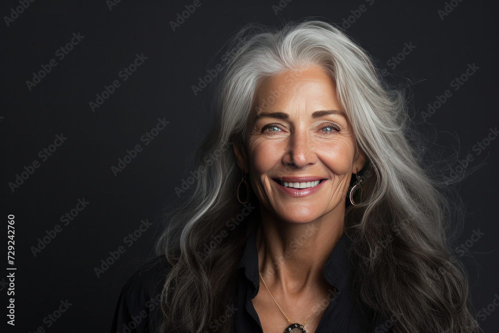A beautiful aging mature woman with long gray hair and happy smiling touch face. A beautiful aging mature woman with long gray hair and happy smiling touch face.