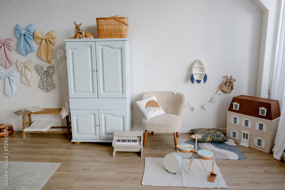 Fototapeta premium Wardrobe in a children's room with toys.
