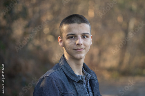 portrait of a happy boy outside