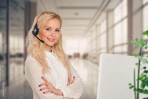 Beautiful young  fwmale worker in customer service photo