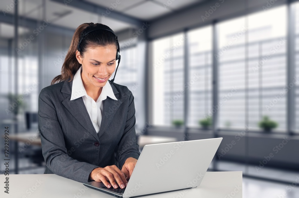 Beautiful young fwmale worker in customer service Beautiful young fwmale worker in customer service