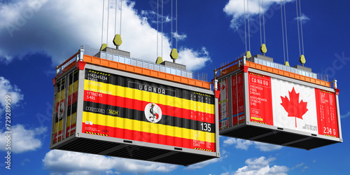 Shipping containers with flags of Uganda and Canada - 3D illustration