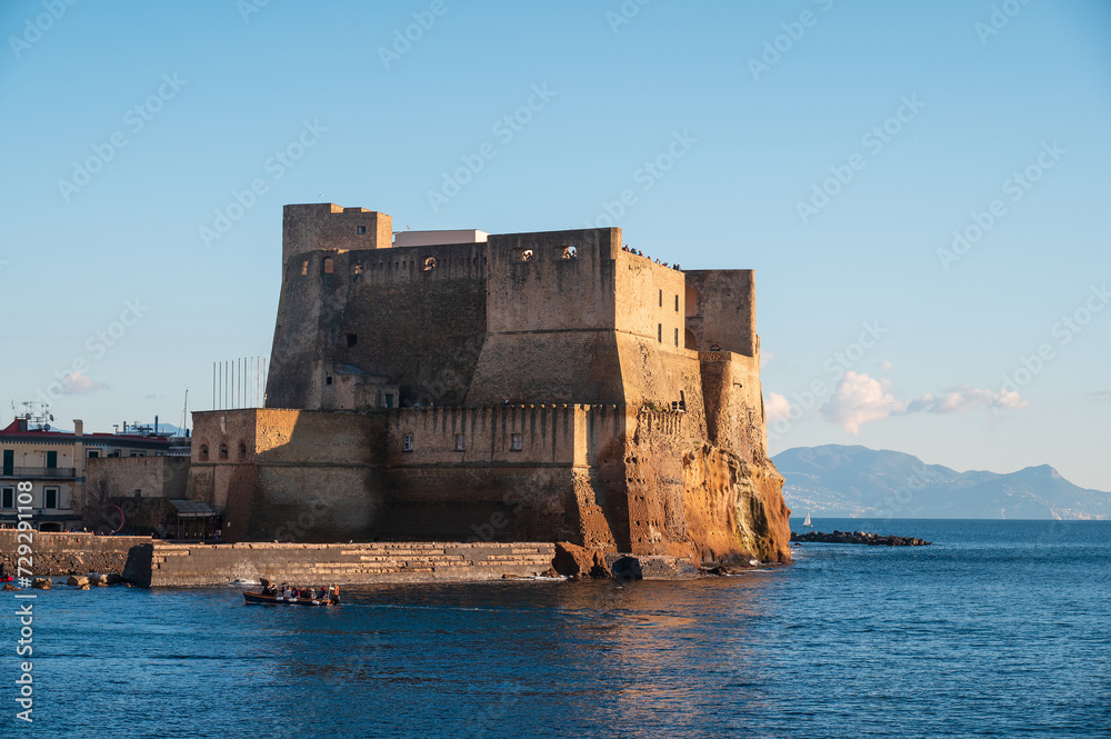 Ovo Castle on a rocky island in Naples, Italy as one of the city landmarks