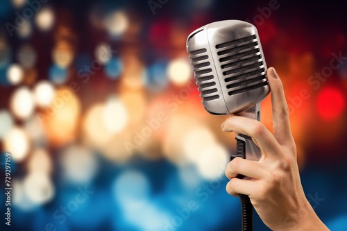 Photography Metal microphone on colorful bokeh blurred background