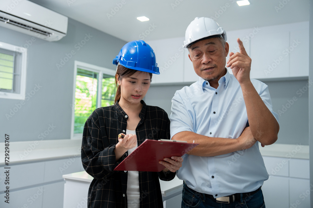 Senior home inspector checking home defects and teaching young engineers, before handing it over to client. Young engineers learn home inspection with Senior, Real estate, and renovation concepts. Senior home inspector checking home defects and teaching young engineers, before handing it over to client. Young engineers learn home inspection with Senior, Real estate, and renovation concepts.