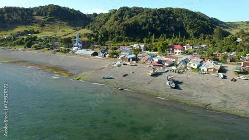 Aerial Drone Fly Above Beach Village Landscape, Tenaun Chiloé Island Archipelago photo