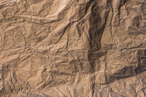 Crumpled craft tissue paper sheet. Texture. Background.
