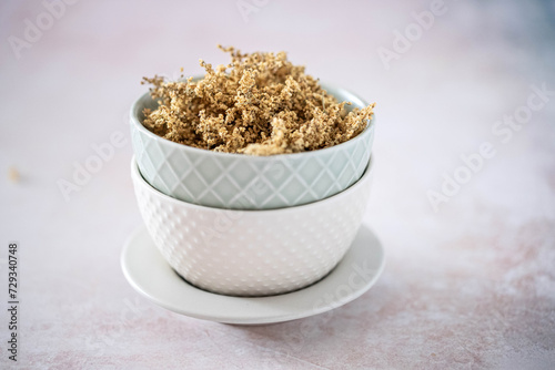 Dry elderflower in a bowl