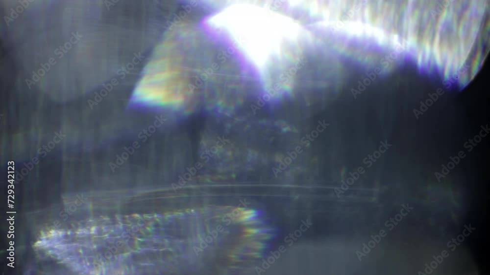 Glass light lens flare light leaks overlay on a black background