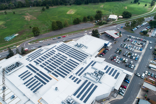 Roof of shopping center covered in solar panels photo