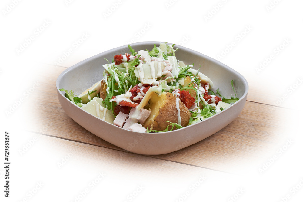 Bowl with hot patatoes, salad and caesar on white and wood Bowl with hot patatoes, salad and caesar on white and wood