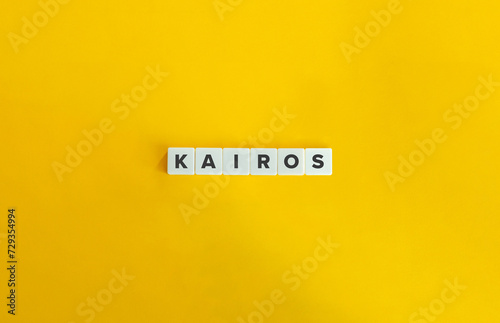 Kairos Word. Rhetorical Device, Persuasive Speaking and Argument. Text on Block Letter Tiles on Flat Background. Minimalist Aesthetics. photo