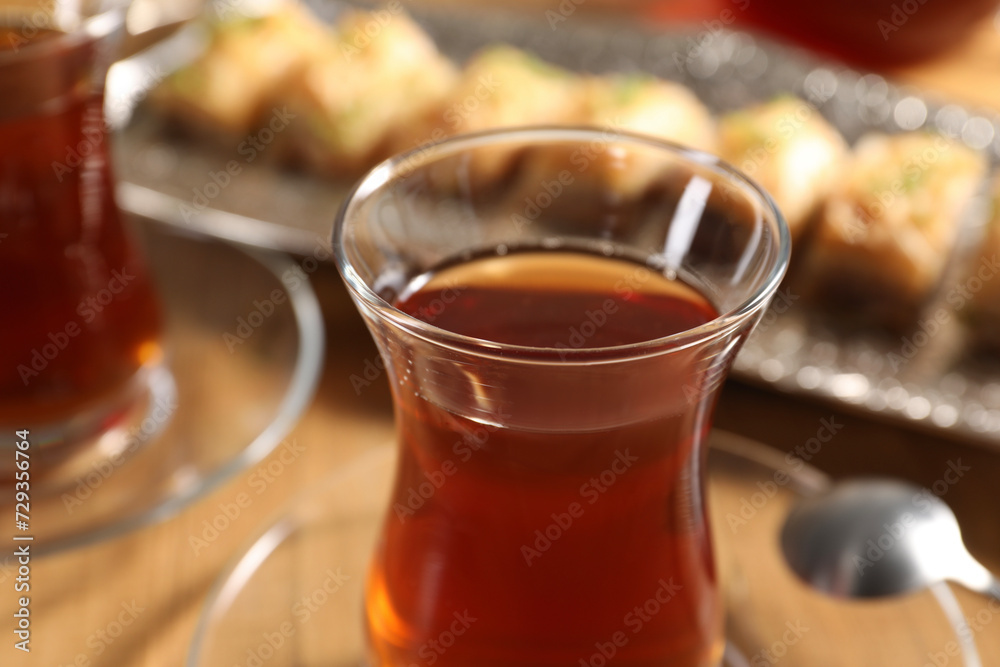 Traditional Turkish tea in glasses on table, closeup Traditional Turkish tea in glasses on table, closeup