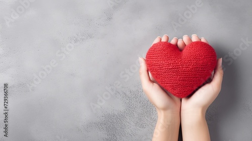 Valentines day greeting card. Red heart on the gray background photo