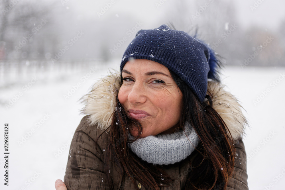Woman under a snowfall, Milan, Italy Woman under a snowfall, Milan, Italy