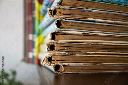 old books on a bookshelf photo