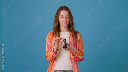 Woman examines empty wallet throwing away out of uselessness