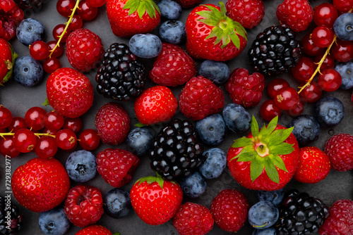 Berries Background. Strawberries, Blueberry, Raspberries, and Blackberry.