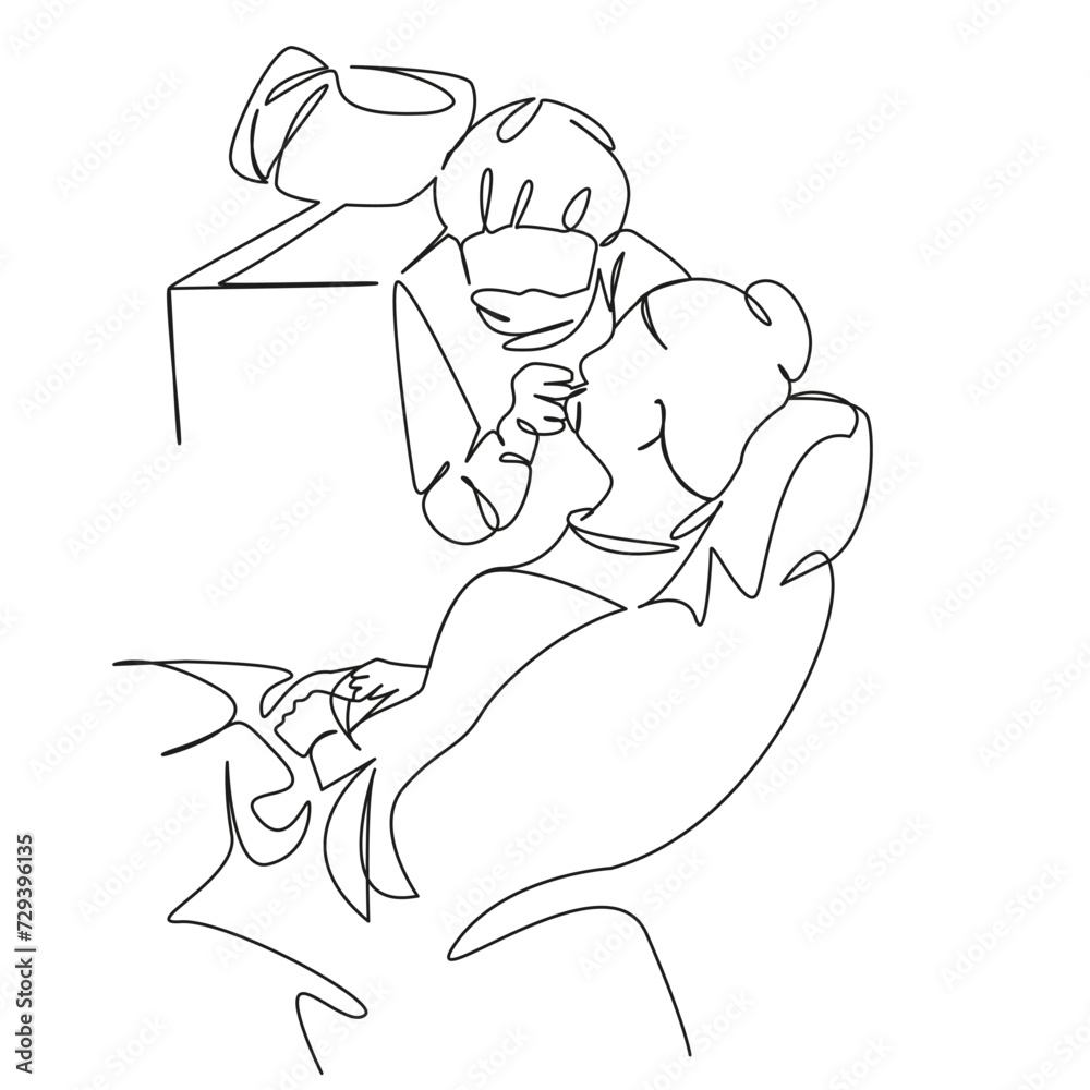 dentist treating woman's teeth