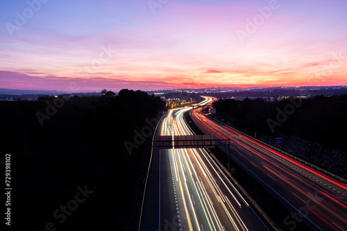 Elevated view of the AP-7 motorway at dusk as it passes through Mollet del Valles in the province of Barcelona in Catalonia Spain