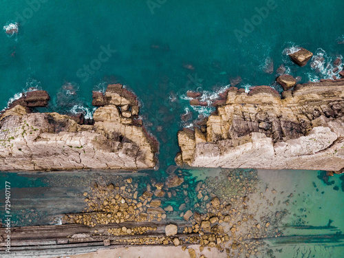 sea rocks turquoise water aerial topview