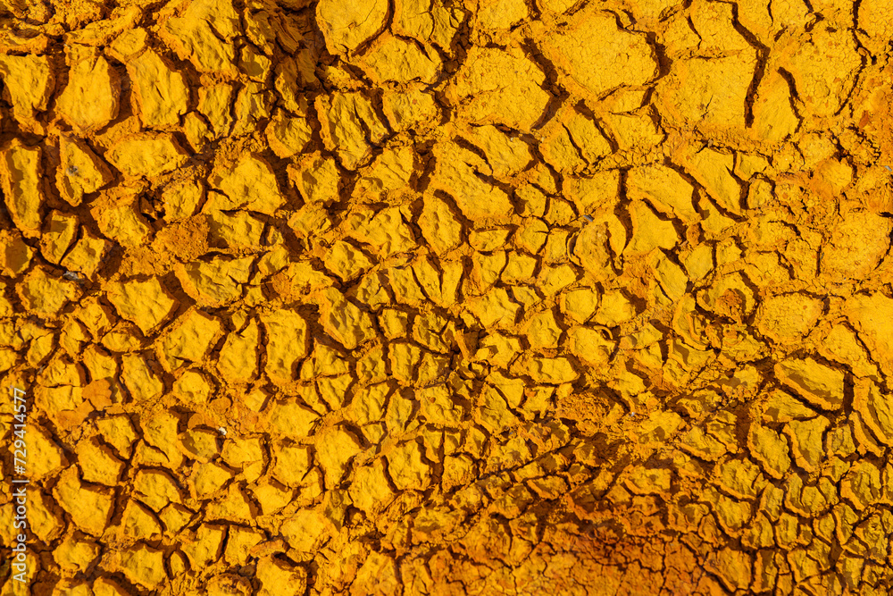 Sunlit Cracked Clay Soil in Rio Tinto Sunlit Cracked Clay Soil in Rio Tinto
