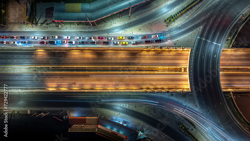 Expressway top view, Road traffic an important infrastructure, Drone aerial view fly in circle, traffic transportation, Public transport or commuter city life concept of economic and energ, transport. © suriyapong