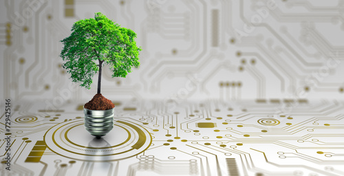 Tree with soil growing on  Light bulb. Digital Convergence and and Technology Convergence. Blue light and network background. Green Computing, Green Technology, Green IT, csr, and IT ethics Concept.