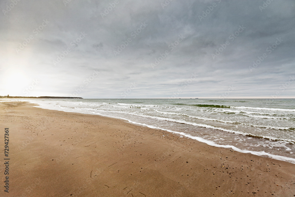 Beach with incoming waves from the Baltic Sea. Beach with incoming waves from the Baltic Sea.