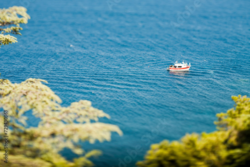 Elevated perspective of fishing boat in water. photo