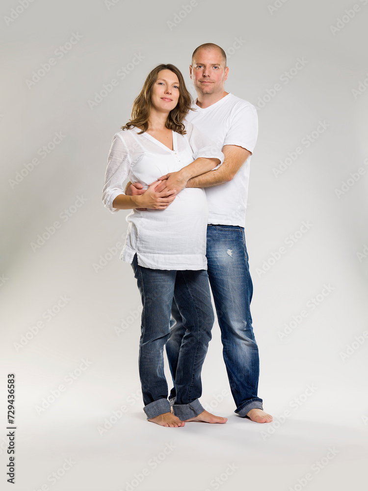 Husband and wife together in studio shot. Husband and wife together in studio shot.