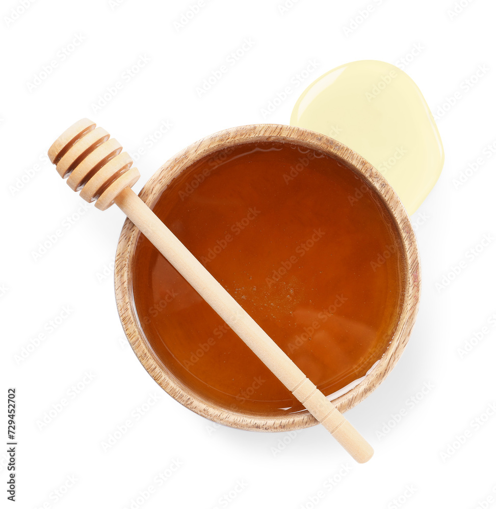 Tasty honey in bowl and dipper isolated on white, top view Tasty honey in bowl and dipper isolated on white, top view