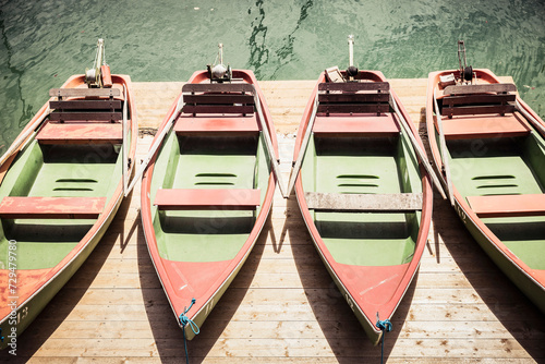 Row boats on the dock of a lake. Walchensee, Germany