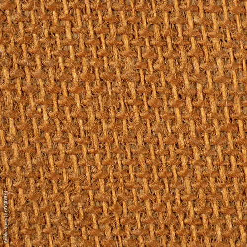 Macro burlap fabric texture woven eco-friendly brown background close-up