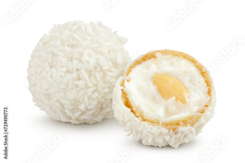 round candy raffaello with coconut flakes and nut isolated on white background photo