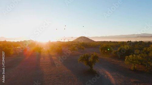 Piramide de teotihuacan al amanecer con globos aerostaticos  photo
