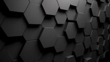 A mesmerizing display of monochromatic art, the symmetrical black hexagons on the wall evoke a sense of abstract beauty within the confines of a building