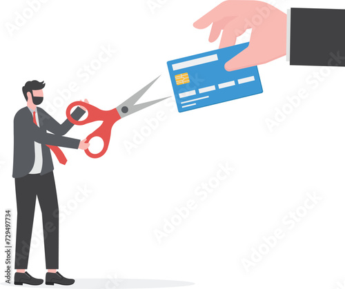 Credit card cutting. Businessman using scissors to cut credit card,destruction concept

