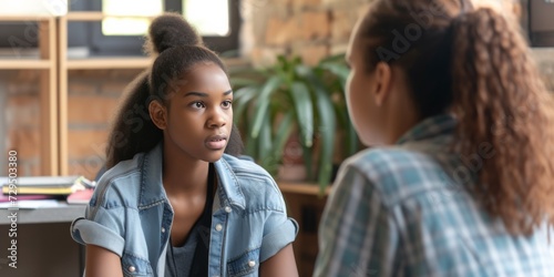 Empathetic School Psychologist Providing Support To Distressed African Teenager In Educational Setting. Сoncept Mental Health Counseling, Cultural Understanding, School-Based Interventions
