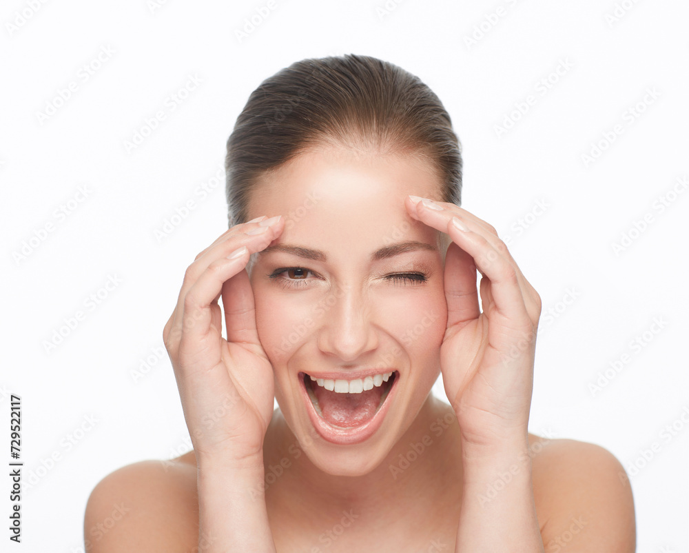 Portrait, happy and woman wink for skincare, flirt or natural beauty isolated on white studio background. Face, blink and smile of model in cosmetics excited for spa facial treatment for healthy skin Portrait, happy and woman wink for skincare, flirt or natural beauty isolated on white studio background. Face, blink and smile of model in cosmetics excited for spa facial treatment for healthy skin
